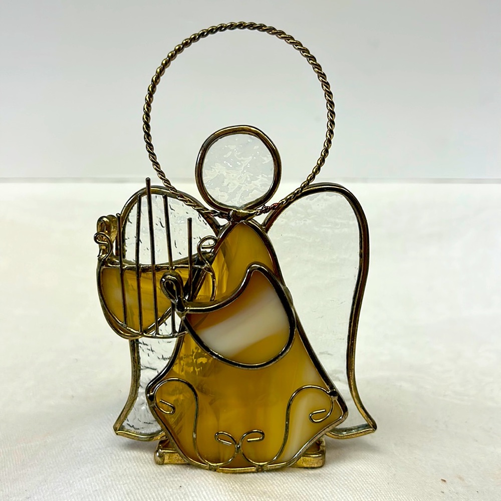 Vintage stained glass angel playing the harp tea light holder